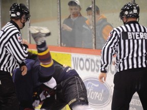 In a fight with Woodstock’s Craig Thomson, New Hamburg's Reid Oliver lost his footing and accidentally cut the throat of linesman Kevin Brown, who suffered a stroke and was temporarily paralyzed. His story is one of many told in a new book. Postmedia file photo