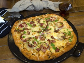 Sausage and Sauerkraut pizza sounds odd but tastes great.
(Mike Hensen/The London Free Press)