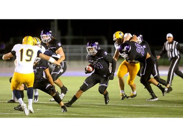 Cedric Joseph had lots of room to run as he gets more yards against the Windsor Lancers during their night game at TD Stadium in London Thursday. (Mike Hensen/The London Free Press)