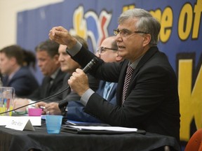 Tariq Khan speaks to voters during a Ward 8 all candidates meeting a Oakridge Secondary School in London. (Derek Ruttan/The London Free Press)