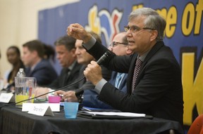 Tariq Khan speaks to voters during a Ward 8 all candidates meeting a Oakridge Secondary School in London. (Derek Ruttan/The London Free Press)