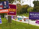 Election signs at the intersection of Riverside Avenue and Wonderland Road in London in 2018. (Mike Hensen/The London Free Press)