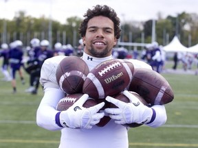 Western Mustangs running back Alex Taylor has carried a lot footballs upfield during his time with the team. Photo shot in London, Ont. on Wednesday October 17, 2018. (DEREK RUTTAN, The London Free Press)