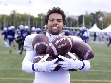 Western Mustangs running back Alex Taylor has carried a lot footballs upfield during his time with the team. Photo shot in London, Ont. on Wednesday October 17, 2018. (DEREK RUTTAN, The London Free Press)
