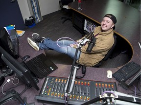 Daniel Mitchell-Benoit is a student disc jockey at Fanshawe College's radio station CIXX-FM 106.9 The X in London. The station is celebrating its 40th anniversary this month. (Derek Ruttan/The London Free Press)