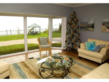 Traditional holiday colours of red and green don't suit blue decor or the lake views at 204 Adelaide St., Port Stanley, part of the holiday home tour. Instead, the designer used sand and surf shades to create a winter wonderland. Mike Hensen/The London Free Press