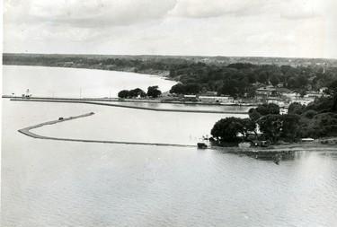 Port Dover aerial shows the shape of a 1,200 foot breakwater being built as the first stage of a $596,000 harbor expansion project, 1967. (London Free Press files)
