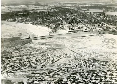 The icy wasteland outside the Port Dover harbor has hemmed in the local fishing fleet, despite the efforts of trawlers at ice-breaking, 1967. (London Free Press files)