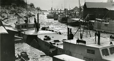 Ice has locked the Port Dover fishing fleet in harbor, 1962. (London Free Press files)