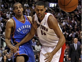 Thabo Sefolosha gets held up by Toronto Raptors Patrick O'Bryant in the first half of action between the Raptors and Oklahoma City Thunder at the Air Canada Centre March 27th, 2009. (Postmedia News file photo)