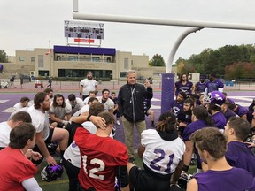 Western Mustangs head coach Greg Marshall talks to his players at the end of a practice. (Paul Vanderhoeven/The London Free Press)