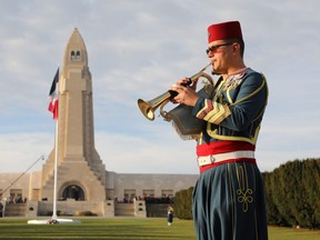 A musician dressed as a Zouave plays trumpet on November 6, 2018 at the Ossuary of Douaumont near Verdun, northeastern France, during ceremonies marking the centenary of the First World War. - The French President kicked off a week of commemorations for the 100th anniversary of the end of World War One, which is set to mix remembrance of the past and warnings about the present surge in nationalism around the globe. (Photo by ludovic MARIN / various sources / AFP)LUDOVIC MARIN/AFP/Getty Images