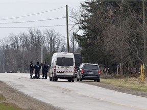 Fourth Line Road of the Six Nations of the Grand River Territory is closed between Tuscarora and Onondaga road, including the main entrance to the landfill, on Sunday Nov. 25, 2018 as police continue their investigation into a triple homicide. Three Six Nations residents were found murdered Nov. 4, 2018 in Middlesex Centre, near the Oneida Nation of the Thames, near London. (Brian Thompson/Postmedia Network)