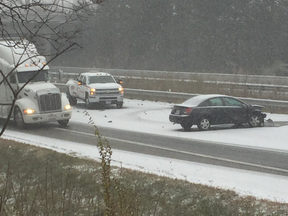 This crash on Hwy. 403 at Brantford illustrated what drivers faced across Southwestern Ontario, especially in London, as the season's first heavy snowfall hit on Thursday afternoon. (Brian Thompson/Postmedia)