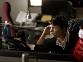 This file photo shows a 911 operator working for the Edmonton police. (Postmedia)