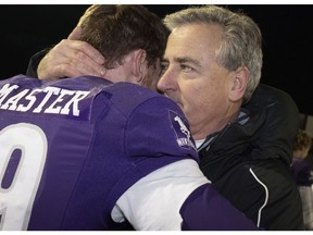 Western Mustangs head coach Greg Marshall consoles receiver Harry McMaster after Saturday’s Vanier Cup loss to Laval Rouge et Or. (Denys Pelletier/ THE CANADIAN PRESS)