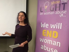 London Abused Women's Centre fund development co-ordinator Fabienne Haller speaks at the finale of the 2098 Shine the Light on Woman Abuse campaign Friday. (JENNIFER BIEMAN, The London Free Press)