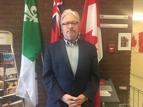 Jean-Pierre Cantin, the executive director of the francophone community centre in London, said Franco-Ontario flags will be flying at half-mast as a response to the cancellation of the French-language university. (HEATHER RIVERS, The London Free Press)