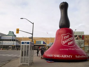 In this 2017 file photo, a big red bell heralds the start of the Salvation Army's kettle campaign in London.