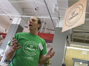 Old East Village Grocer manager Paul Seale stands at the entrance to the full-service Dundas Street grocery store in London, Ont. on Wednesday September 14, 2016. (Free Press file photo)