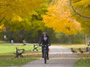 Barney Hughes a cycling fan who rides to work every day through Gibbons Park on his way to Western credits cycling with changing his life. Hughes says he was stuck in a deep depression back in 2004 and was unemployed, but he started to watch cycling on the Tour de France, and decided to give it a try. Hughes says the exercise of even a small ride was enough to help pull him out of a deep depression, and he's still going strong  on Tuesday October 30, 2018.  Mike Hensen/The London Free Press/Postmedia Network