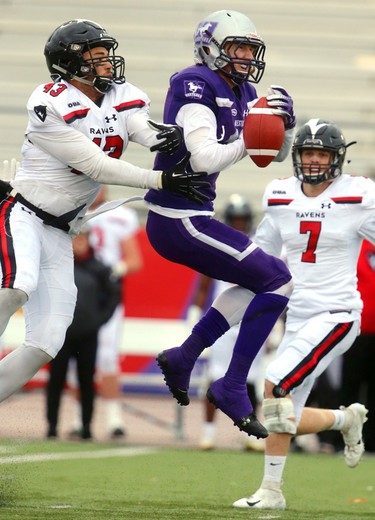 Western wide receiver Harry McMaster can't hold on to a pass over the middle as he's hit by Carleton linebacker Trevor Hoyte during their semi-final Saturday November 3, 2018 at Td stadium.
Western won 39-13 and will move on to face Guelph next week at home for the Yates Cup.
Mike Hensen/The London Free Press/Postmedia Network