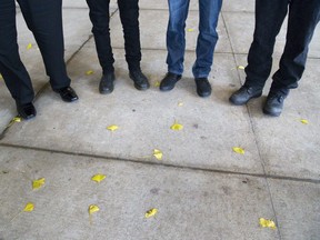 Victims of David Norton outside the courthouse. (Derek Ruttan/The London Free Press)