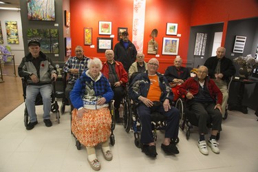 Some of the artists that contributed to "100 Years In The Making"  an exhibit featuring artwork by the veterans of Parkwood Institute at Art With Panache Gallery. Front row L to R Glenna Stenning, Sidney Koopmans, and Stan Lee. Second row L to R John Doucette, Lorne Spicer, Harry Favell, Dick Carr, Bob Armstrong and Jim Purvis. Standing in back  Erick Faulkner. Derek Ruttan/The London Free Press/Postmedia Network
