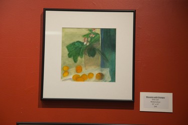 Blossoms With Oranges by Dick Carr is one of the pieces featured in  "100 Years In The Making"  an exhibit featuring artwork by the veterans of Parkwood Institute at Art With Panache Gallery in London, Ont. on Tuesday November 6, 2018.  Derek Ruttan/The London Free Press/Postmedia Network