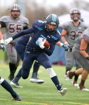 Lucas wide receiver Will Adam, bounces outside and scores the first Lucas touchdown bringing them to 8-8 with the South Lions in the fourth quarter of their TVRA Central championship game at the City Wide fields on Thursday November 8, 2018.  After a 1-1 first half where both teams made great stops, and missed field goals, South went ahead 8-1 in the fourth only to be matched immediately by Lucas making the game 8-8. A late run by Lucas'Nicholas Barnes sealed the deal at 14-8 as both teams stuggled to move the ball and each team had a massive amount of penalties. Mike Hensen/The London Free Press/Postmedia Network