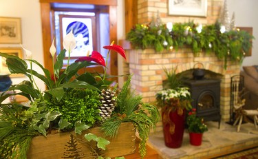 Parkway Gardens decorated this mantel in the stone cottage home of Andrew Mitchell.  Mike Hensen/The London Free Press/Postmedia Network