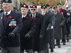 Veterans march to the Remembrance Day service at the cenotaph  on Sunday Nov. 11, 2018. (Derek Ruttan/The London Free Press)