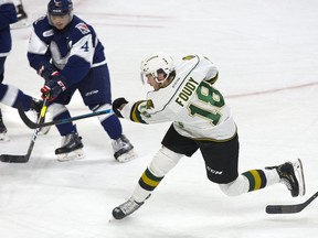 Liam Foudy of the London Knights unleashes a slap shot during their game against Kitchener Rangers at Budweiser Gardens on Sunday Nov. 11, 2018. (Derek Ruttan/The London Free Press)