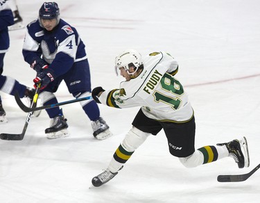 Liam Foudy of the London Knights unleashes a slap shot during their game against Kitchener Rangers at Budweiser Gardens in London, Ont. on Sunday November 11, 2018. Derek Ruttan/The London Free Press/Postmedia Network