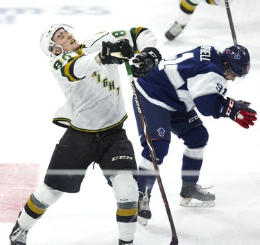 Alex Formenton of the London Knights reacts to a high stick from Chase Campbell of the Kitchener Rangers during their game at Budweiser Gardens in London, Ont. on Sunday November 11, 2018. No penalty was called on the play. Derek Ruttan/The London Free Press/Postmedia Network