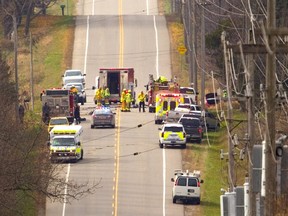 OPP, fire and ems were at the scene of a fatal collision on Medway Road west of Richmond Street after noon on Monday.  (Mike Hensen/The London Free Press)