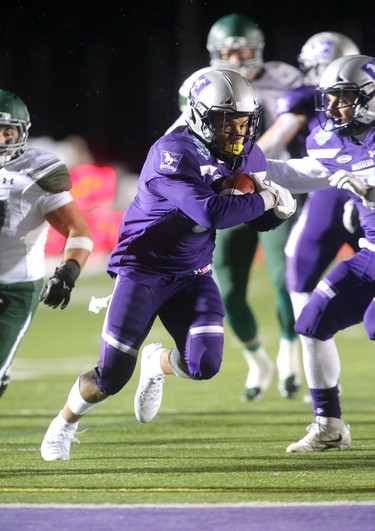 The Western Mustangs offence came to life in the second half of the Mitchell Bowl with the offensive line repeatedly opening holes for Alex Taylor (shown) and Cedric Joseph to open up a sizable lead over the Saskatchewan Huskies.
The Mustangs fought to a 17-17 tie at the half with a Mark Liegghio field goal before taking control in the second half for a convincing 47-24 win punching their tickets for Quebec City next week against Laval in the Vanier Cup. 
Photograph taken on Saturday November 17, 2018.  
Mike Hensen/The London Free Press/Postmedia Network