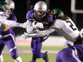 The Western Mustangs offence came to life in the second half of the Mitchell Bowl with the offensive line repeatedly opening holes for Alex Taylor and Cedric Joseph (shown) to open up a sizable lead over the Saskatchewan Huskies. (Mike Hensen/The London Free Press)