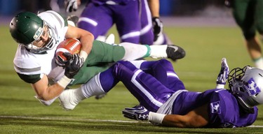 Western defensive back Alex Salytchev gets rocked by Tyler Chow running back for the Saskatchewan Huskies who lowered his helmet into Salytchev's shoulder during the Mitchell Bowl played Saturday at TD stadium
The Mustangs fought to a 17-17 tie at the half with a Mark Liegghio field goal before taking control in the second half for a convincing 47-24 win punching their tickets for Quebec City next week against Laval in the Vanier Cup. 
Photograph taken on Saturday November 17, 2018.  
Mike Hensen/The London Free Press/Postmedia Network