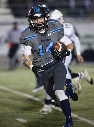 Patrick Murphy of Lucas runs for a touchdown during the WOSSA senior football championship game against CCH at TD Stadium in London. Derek Ruttan/The London Free Press/Postmedia Network