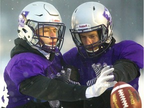 Safety Daniel Valente Jr. knocks away the ball from intended receiver, defensive back Mackenzie Ferguson, Wednesday during the Mustangs' last practice before flying to Quebec City for the Vanier Cup against Laval Saturday. Mike Hensen/The London Free Press