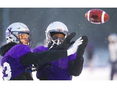 Safety Daniel Valente Jr. knocks away the ball from intended receiver, defensive back Bleska Kambamba Wednesday during the Mustangs' last practice before flying to Quebec City for the Vanier Cup against Laval Saturday. Mike Hensen/The London Free Press
