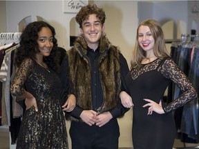 L to R Angelina Deslandes-Archat, Max Woodward and Sierra Palazzo modelled clothing from Goodwill during the fashion show portion of the pop-up shop event by Fanshawe College fashion marketing and management students in London, Ont. on Thursday November 22, 2018. (Derek Ruttan/The London Free Press)