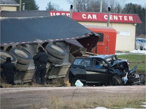 A female motorist is dead after a car and transport truck collided at Highway 4 (Richmond Street) and Denfield Road in Clandeboye, north of Lucan, Friday afternoon, police say. Middlesex and Huron OPP, Middlesex and Huron EMS, and the Lucan-Biddulph and Granton fire departments were called to the crash about 1 p.m., OPP Const. Max Gomez said. The name of the deceased was not released pending notification of family. The trucker was unhurt, but his vehicle went into the ditch and spilled some of its load of grain. (DEREK RUTTAN, The London Free Press)