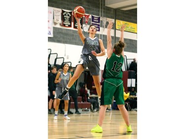 Lauren Tennant of Mother Spartans lays in a shot as the Spartans dominated Ajax's Dennis O'Connor during their OFSAA AA girls basketball quarterfinal game at John Paul II on Friday. The Spartans will have home floor for the semifinal at 10:30 a.m. Saturday but it will be against top-seeded Wallaceburg, who beat Theriauly 68-47 in the quarters. (MIKE HENSEN, The London Free Press)