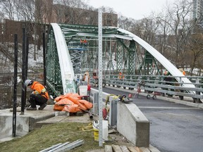 Work continues on Blackfriars Bridge in preparation for the grand reopening of the rebuilt historic crossing Saturday. (Derek Ruttan/The London Free Press)