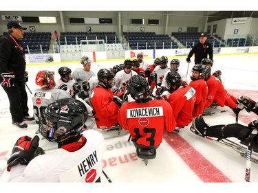 Team Canada huddles briefly after practice Friday November 30, 2018 at the Western Fair Sports Centre.  (Mike Hensen/The London Free Press)