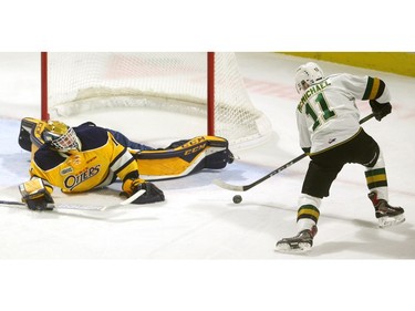 Connor McMichael of the Knights almost gets his second goal as he has Erie Otters goalie Daniel Murphy down, but he can't get the puck over him  at Budweiser Gardens in London on Friday night. McMichael did get a second goal, but not until the third period, then he added a third. (Mike Hensen/The London Free Press)