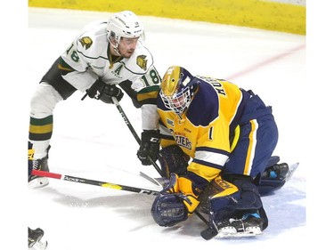Liam Foudy of the Knights gets in tight on Erie Otters goalie Daniel Murphy but can't get the puck under him aat Budweiser Gardens in London on Friday.  (Mike Hensen/The London Free Press)