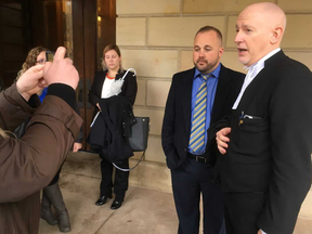 Michael Wilkins, left, and lawyer Ron Ellis speak to media outside of the Elgin County Courthouse after Wilkins was found not guilty Thursday of manslaughter in the dead of  Danny Digiandomenico. (Derek Ruttan/The London Free Press)
